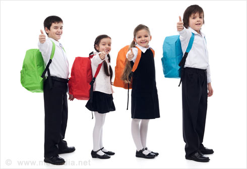 Group Of School Children With School Bags And Backpacks Go To School View  From The Back Concept Back To School Education September 1 Knowledge Day  Stock Photo - Download Image Now - iStock